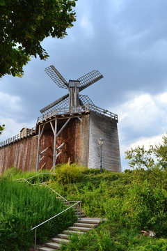 GERMANY, BAD ROTHENFELDE, 2018: Salt cooling tower in the resort town.Gradierwerk and windmill.
