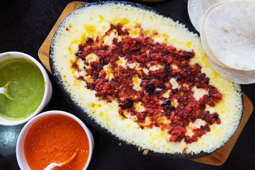 Mexican melted cheese  with chorizo