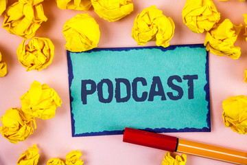 Fototapeta premium Writing note showing Podcast. Business photo showcasing Online media transmission Multimedia entertainment Digital audio written Sticky note paper within paper balls plain background Pen