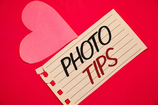 Text sign showing Photo Tips. Conceptual photo Suggestions to take good pictures Advices for great photographyNotebook page red background Pink Heart Black letters Love note romantic