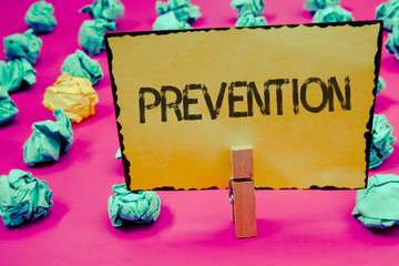 Conceptual hand writing showing Prevention. Business photo showcasing Stopping something from...
