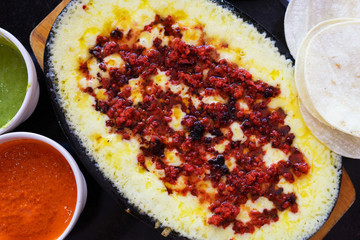 Mexican melted cheese  with chorizo