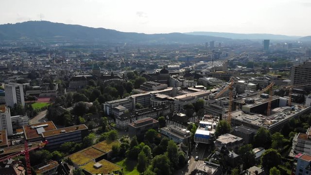 Beautiful drone aerial of Z&uuml;rich, the biggest city in Switzerland. The shot is moving into the direction of the University hospital (USZ) and the University ETH.