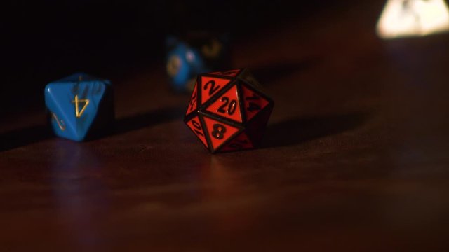 Slow Motion Dice Roll of various Dice with smoke. 4k