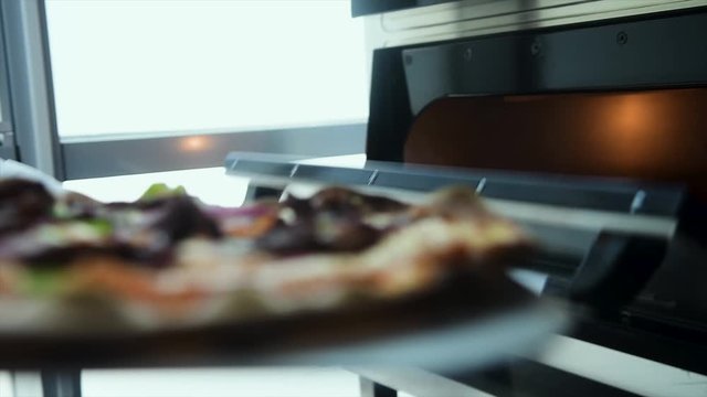 Pizza Making Process in slow motion and normal shot