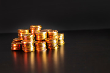 Gold Coins Stock market on a black background 