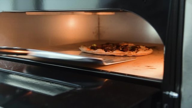 Pizza Making Process in slow motion and normal shot