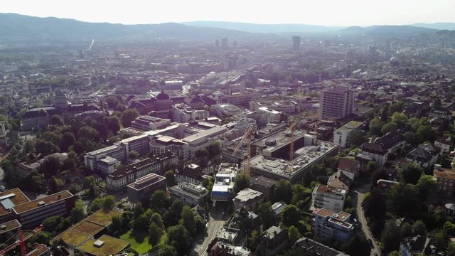 Beautiful drone aerial of Z&uuml;rich, the biggest city in Switzerland. Shot is moving sideways. In the view there is the hospital and the university ETH.