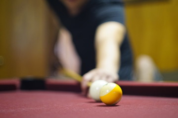 man playing pool