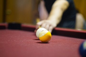 man playing pool