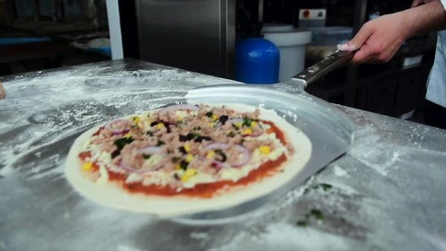 Pizza Making Process in slow motion and normal shot