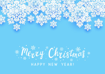 Christmas paper snowflakes on blue background for Your winter holiday design