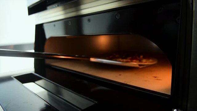 Pizza Making Process in slow motion and normal shot