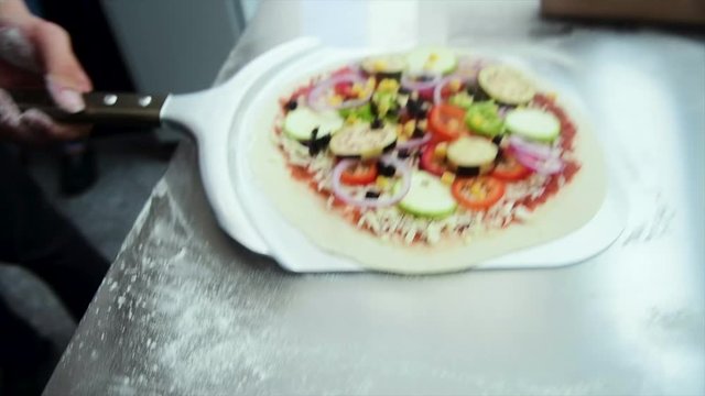 Pizza Making Process in slow motion and normal shot