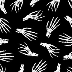Skeleton hand seamless pattern on black background. halloween bones pattern background. vector illustration