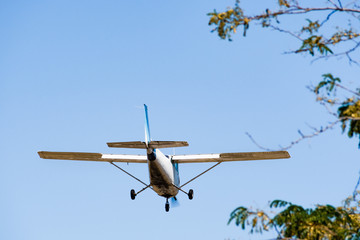 Small, private airplane preparing to land at a regional airport in South San Francisco bay area,...