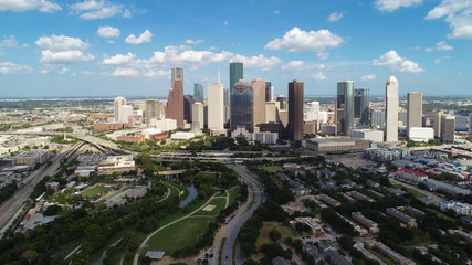 Aerial and panorama view of downtown Houston skyline in a beautiful day (with blue sky and white...