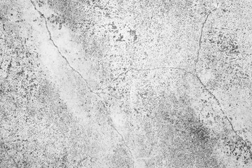 Texture of a concrete wall with cracks and scratches which can be used as a background