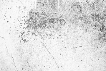 Texture of a concrete wall with cracks and scratches which can be used as a background