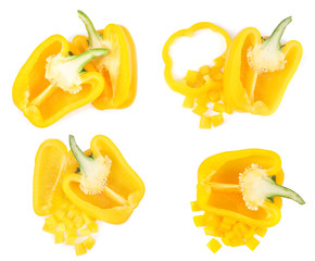 Fototapeta na wymiar Set of ripe yellow bell peppers on white background, top view
