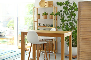 Stylish room interior with beautiful wooden furniture