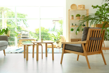 Modern living room interior with comfortable armchair