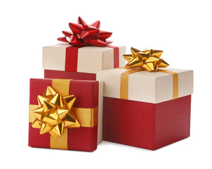 Beautiful gift boxes with bows on white background