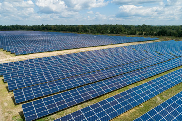 Aerial top view of a solar pannels power plant