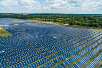 Aerial top view of a solar pannels power plant