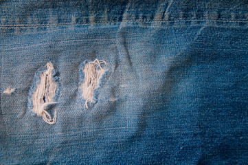 Denim jeans levis Big E texture or denim jeans background with old torn. 
