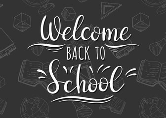 Fototapeta na wymiar Welcome back to school. Lettering on the background of school accessories