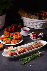  dates wrapped in bacon and delicious tapas