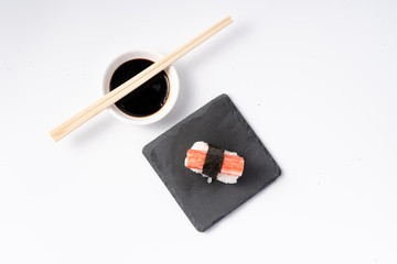 Mix sushi set, Japanese food on slate platte isolated white background