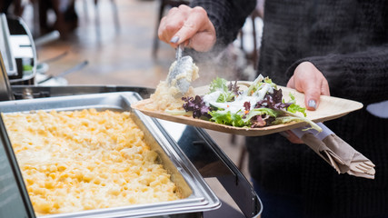 Serving food at buffet