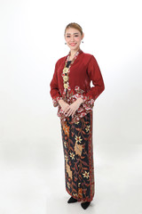 Asian woman traditional red maroon kebaya sharong on white background happy smile