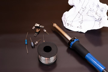 Soldering electrical circuits, soldering iron, electronic components.