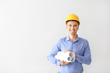 Handsome male architect on white background
