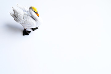 Figurine of a swan on a white background