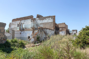 Ruined house. Remains of old houses. Apocalypse. Abandoned city. City of ghosts. Ruins of old...