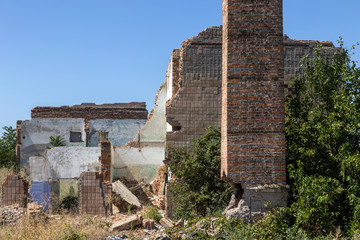 Ruined house. Remains of old houses. Apocalypse. Abandoned city. City of ghosts. Ruins of old...