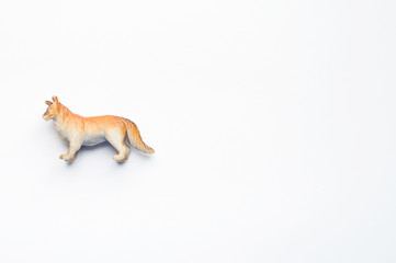 Figurine of a dog on white background