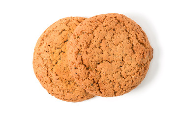 Homemade cookies. Two sweet cookie made from oatmeal flour. Tasty biscuit in high resolution closeup isolated on white background, top. Homemade bakery.