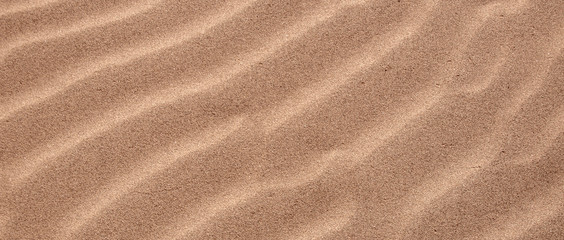 Fototapeta na wymiar Ripple in the golden sand 