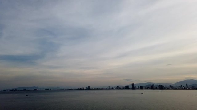 Timelapse of coastal view of Danang City from south Chinese sea during the dusk