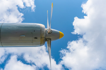 Turboprop airplane engine against the sky. Four Blade Aircraft Propeller.