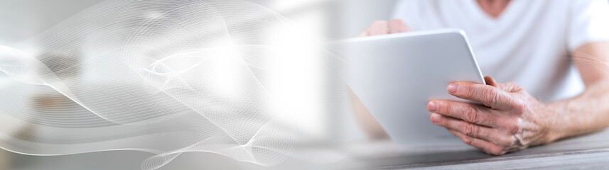 Tablet using  panoramic banner © thodonal