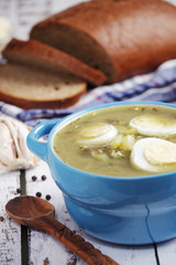 A bowl with homemade sorrel soup