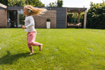 Running with shiny soap bubbles stock photo