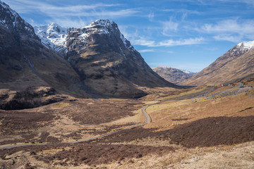 Fototapeta na wymiar Sunny day, bright blue sky, the path in the Scotland highlands