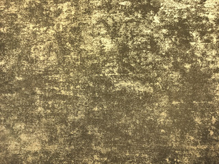 Texture of brown wallpaper with a pattern. Golden paper surface, structure closeup.